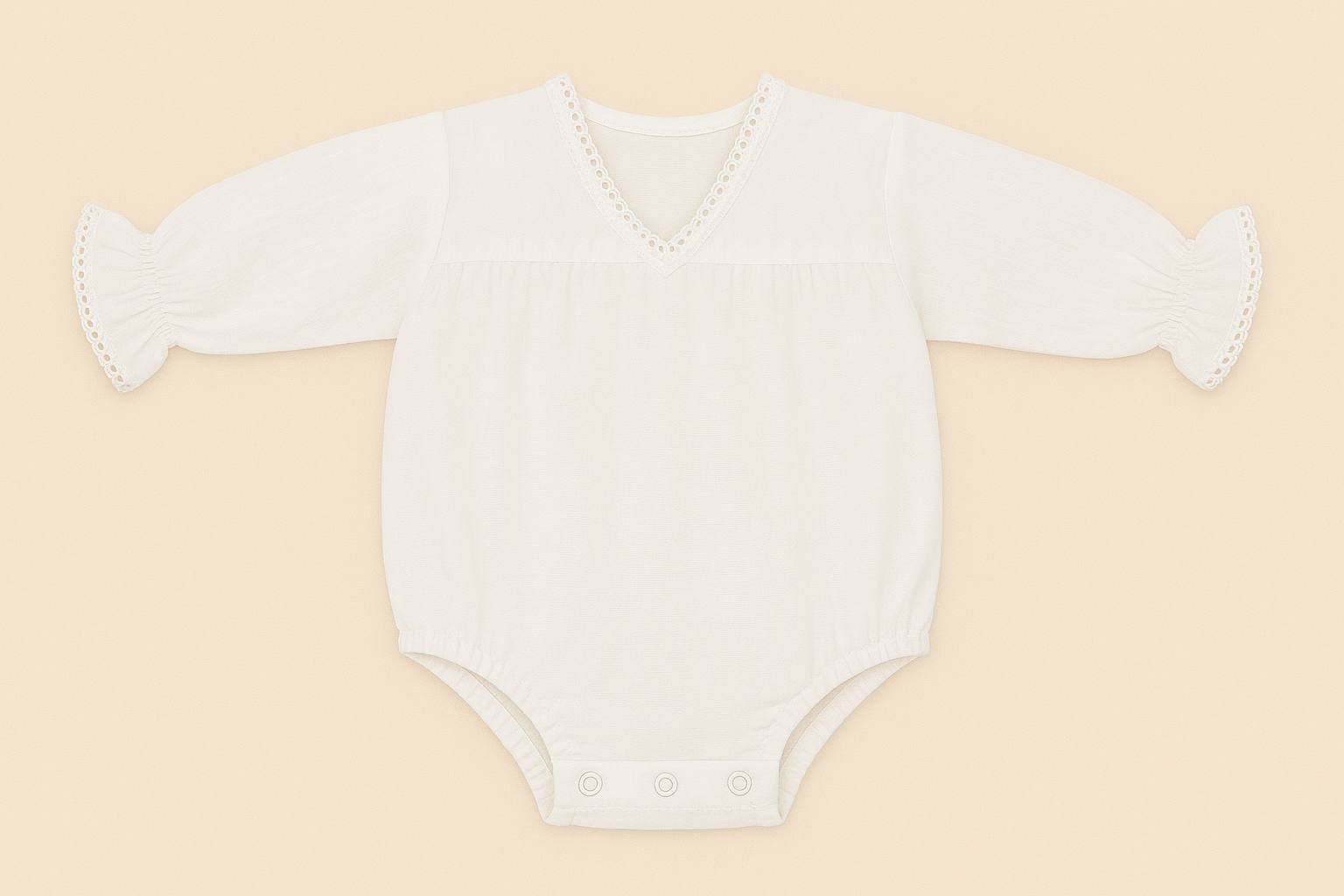 White baby onesie with ruffled sleeves on a beige background