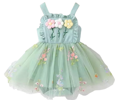 Light green dress with floral embroidery on a white background