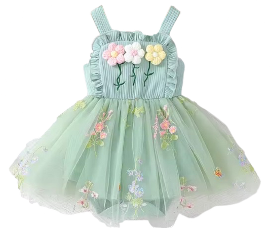 Light green dress with floral embroidery on a white background