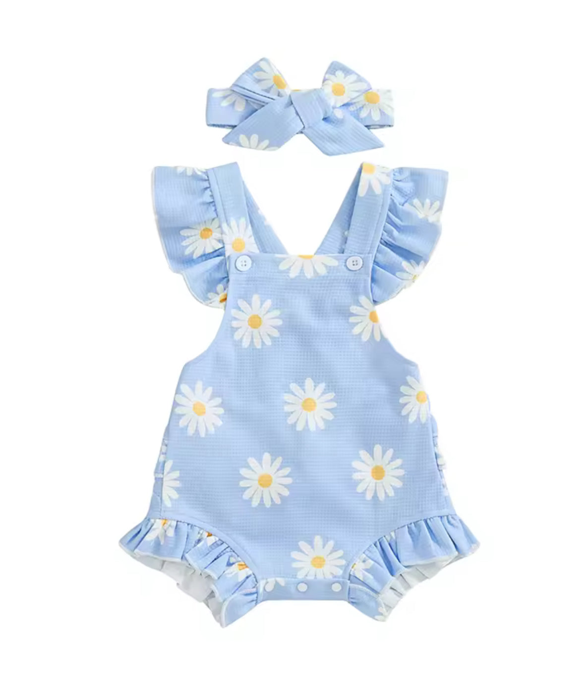 Blue romper with daisy pattern and matching headband on a white background