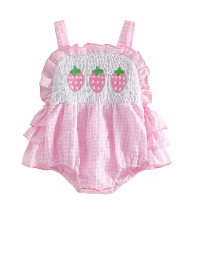 Pink baby romper with strawberry design on a white background
