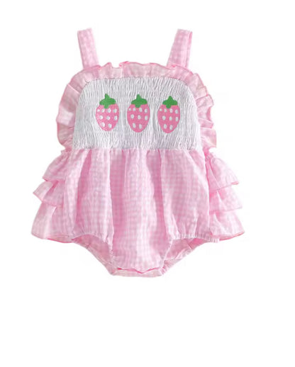 Pink baby romper with strawberry design on a white background